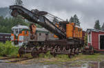 A great machine of the past sits rusting in the po...