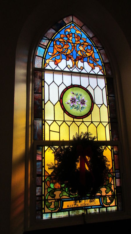 Sun lighting up Stained Glass at Christmas Time 20...