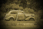 Old car Just sitting in field rusting away...