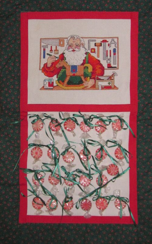 Santa in his workshop - cross-stitched...