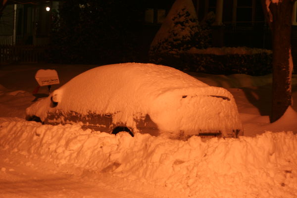 my car after first snowfall of the year illuminate...