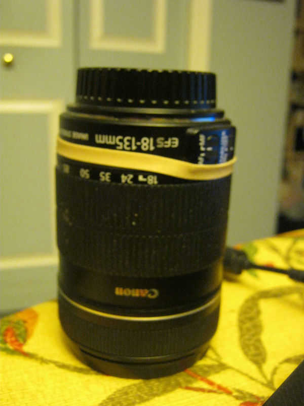 lens with a number 64 rubber band...