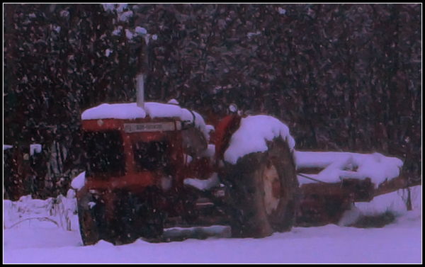 this old tractor was just sittin out in the snow? ...