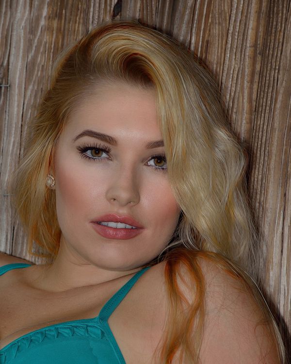 Karissa: A few from the bikini shoot this past summer. After it started ...