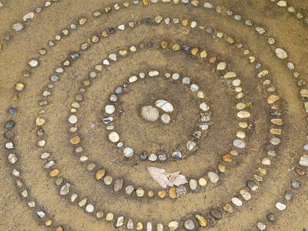 Inlaid pebbles at the entrance to the portress' re...