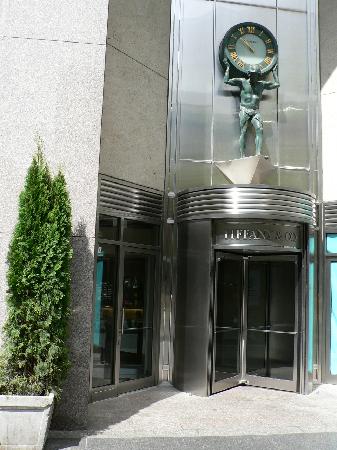 Statue at Tiffany's -  Hands holding the clock wit...