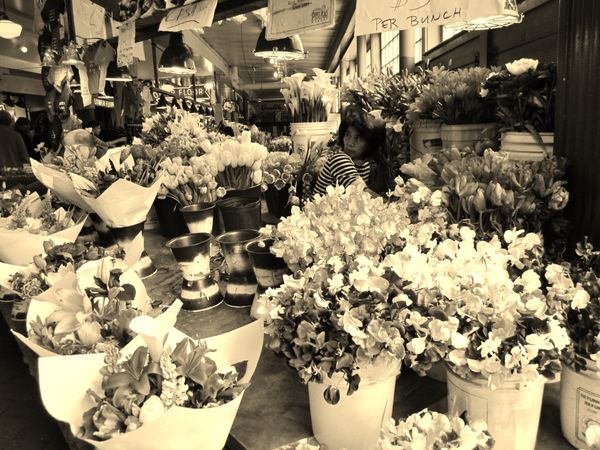 Flower Vendor in Pike's Market in sephia tone...