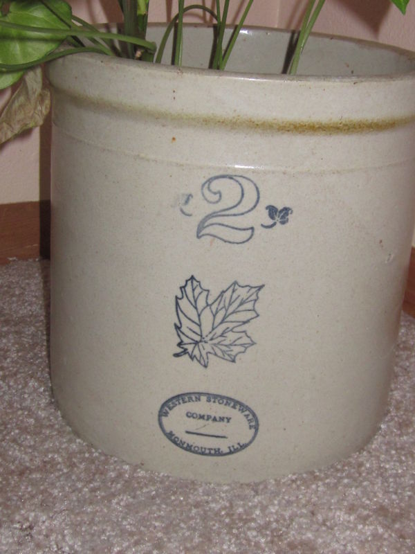 Crock turned flower pot...