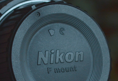 The newer Nikon LF-4.  Is that arrow for tighty or...