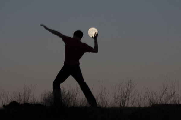 Grandson throwing the Moon...