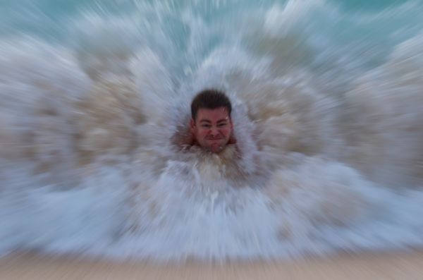 my brother playing in the waves...