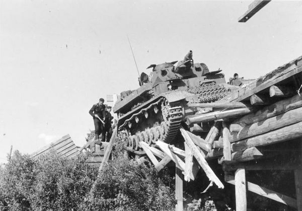 A German tank almost falls off a Russian bridge on...