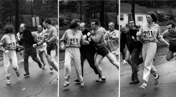 Race official Jock Semple tries to push Kathy Swit...