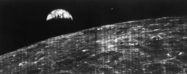 The first photo of the earth from the moon by luna...