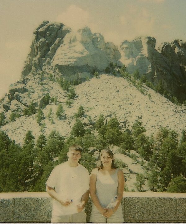 My kids with Mount Rushmore behind them....