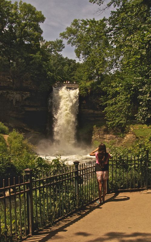 Korynna taking a picture of Minnehaha falls in Min...
