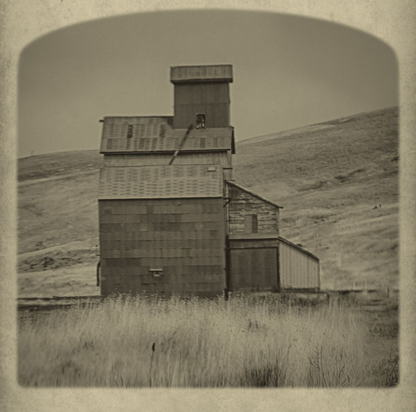 An old grain elevator stands unused...