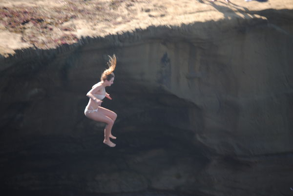 Cliff jumping.Ocean Beach. SD. CA....