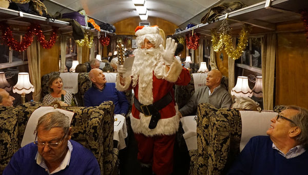 We met Father Christmas on our special train, stea...