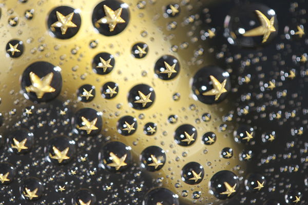 Star under waterdrops on rainx...