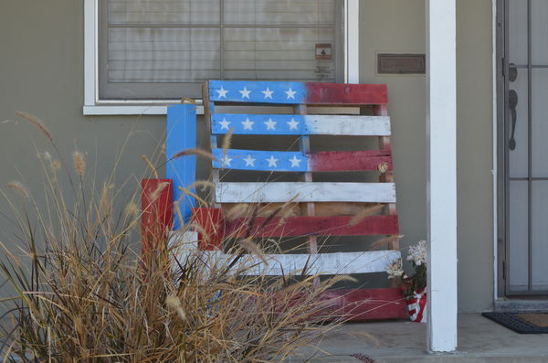 Yard art - pallet painted as a flag...