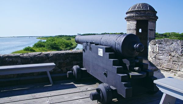 Looking over a canon over the water...