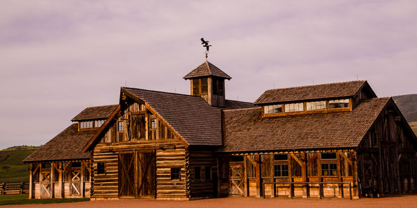 The main barn of the ranch - a bird was on top of ...