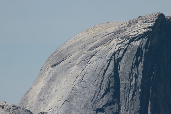 #2-People climbing Half Dome...