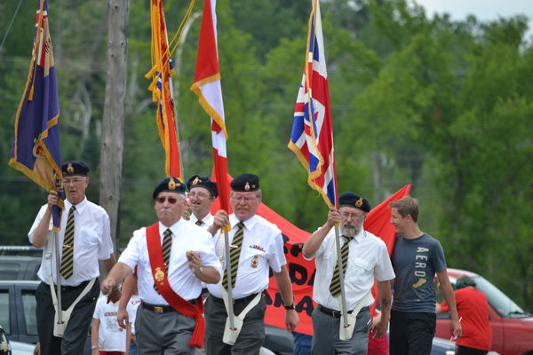 Royal Canadian Legion members in a Canada Day Para...
