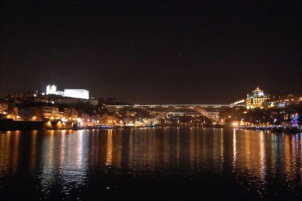 A night shot of Oporto from a boat on the river...