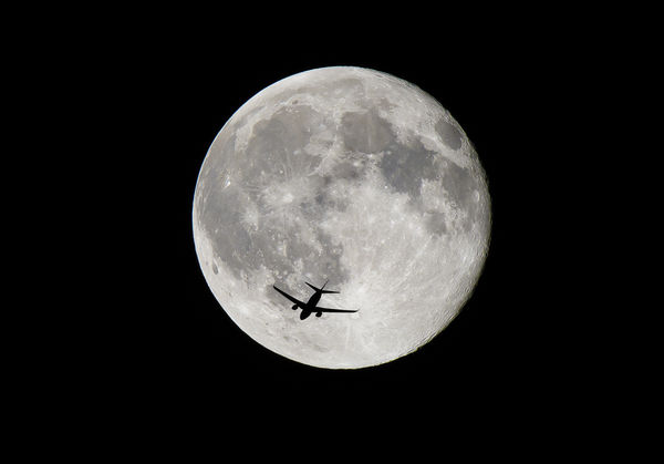 Moon and airliner: Nikon D810, Tamron 150-600. Moo...
