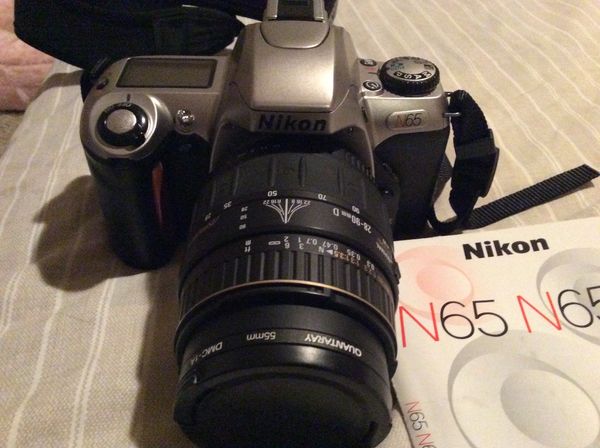 Nikon camera and Minolta XG1 with lenes...