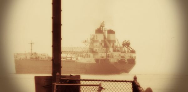 ship by old Coast Guard station pier...