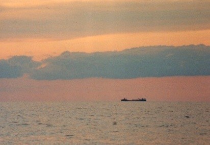 container ship on Lake Erie with cloud bank...