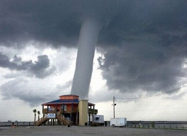 This is called a Water Spout-Tornado over waters...