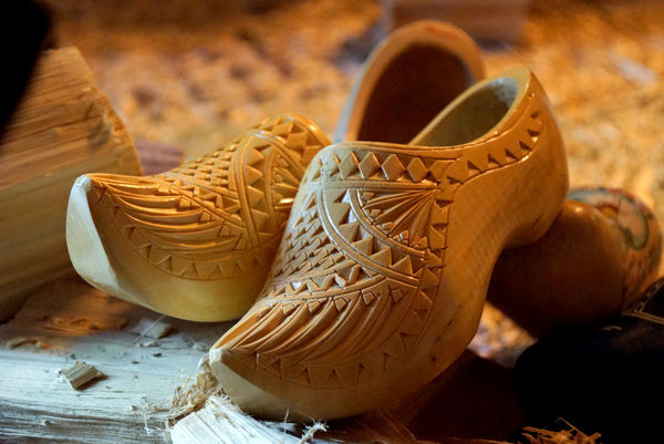 a very fancy hand carved pair of shoes...