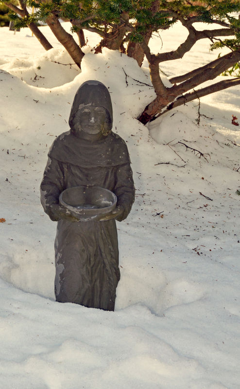 Statue in the snow...