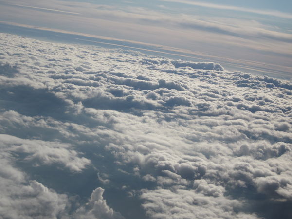 Out the airplane window into the fluffy clouds...