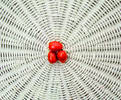 Tomatoes on a White Wicker Table...