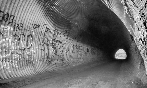 The tunnel is used for vehicles to reach a small f...
