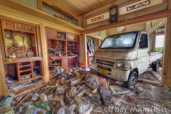 Truck washed into living room, 2 years later. Extr...
