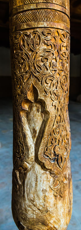 Djuma mosque: Detail of carved wooden pillar...
