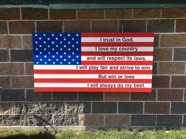 On a wall at the Little League Field...