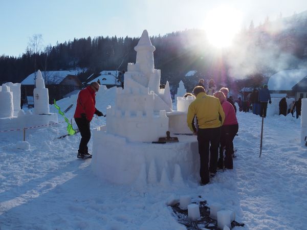 building snow castles and other monuments from sno...