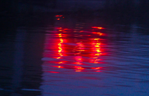 #4  Reflection of tail lights of a passing car, ta...