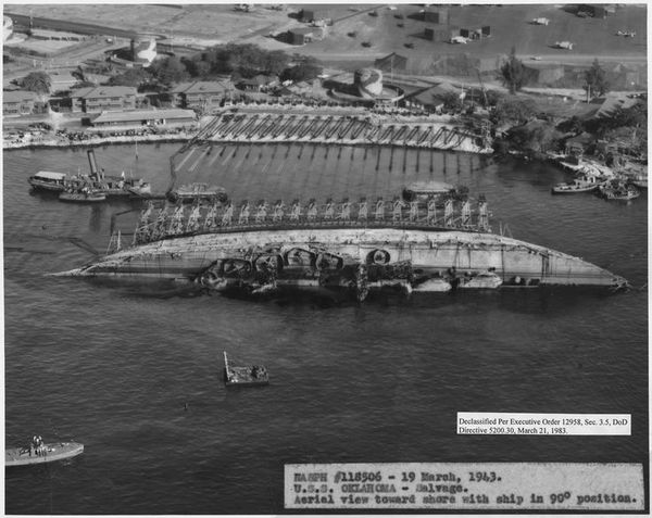 Righting the overturned hull of USS Oklahoma at Pe...
