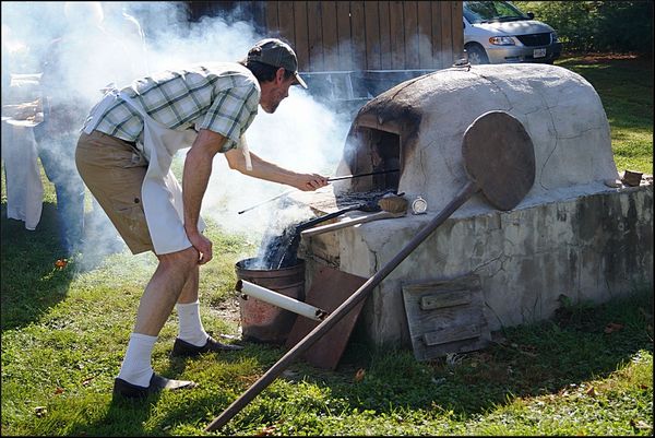 3. Making bread in an outside wood fired oven. Yes...