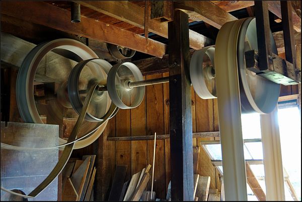 7. Inside the mill, looking at some of the pulleys...