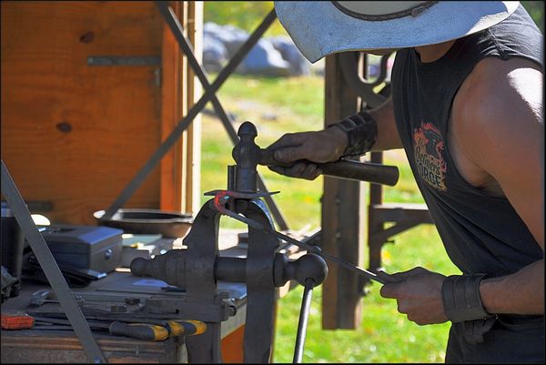 7. A blacksmith demostrating his craft....