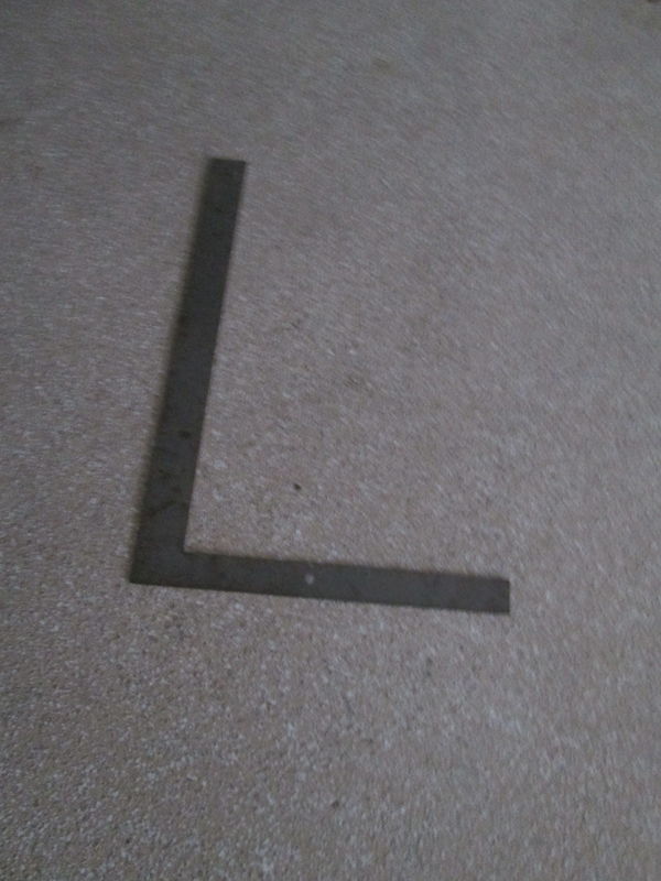 Husband's square is shape of "L"...